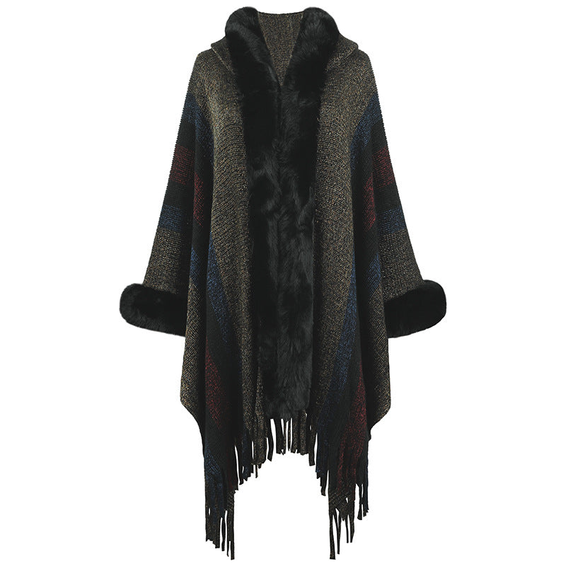 Ladies fashionable poncho with luxurious faux fur collar and fringes