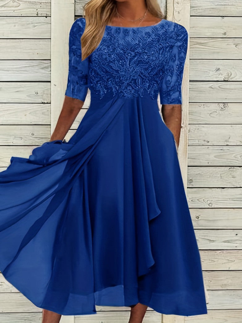 Women's elegant cocktail dress with floral lace top and flowing skirt