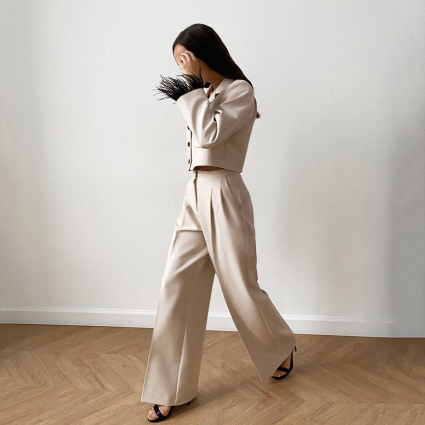 Ladies chic suit set with elegant feathers at the sleeves and high waistband