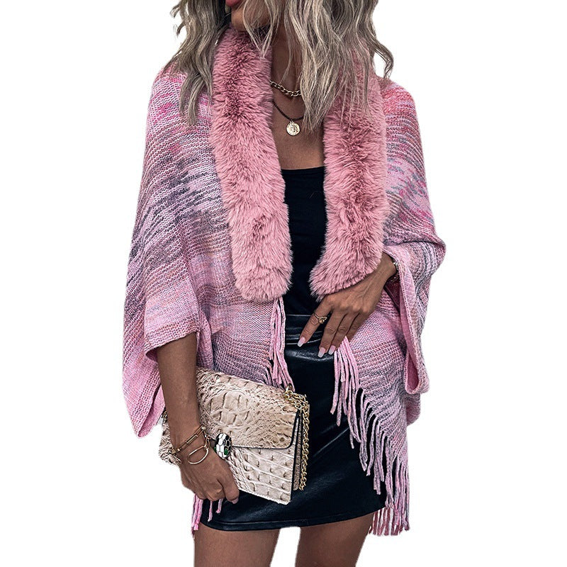 Women elegant poncho with luxurious faux fur collar and fringed hem