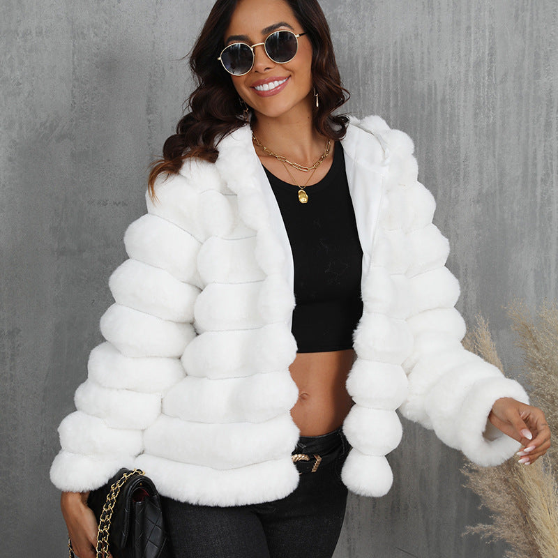 Women's stylish hooded jacket made of faux fur with a textured pattern