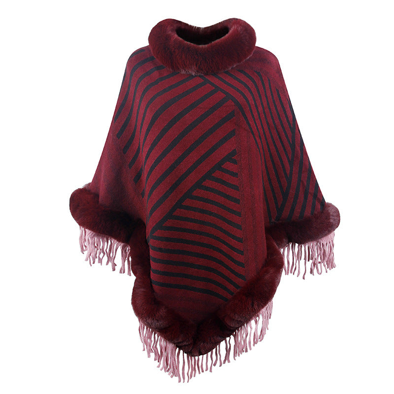 Ladies fashionable poncho with elegant fringe decoration
