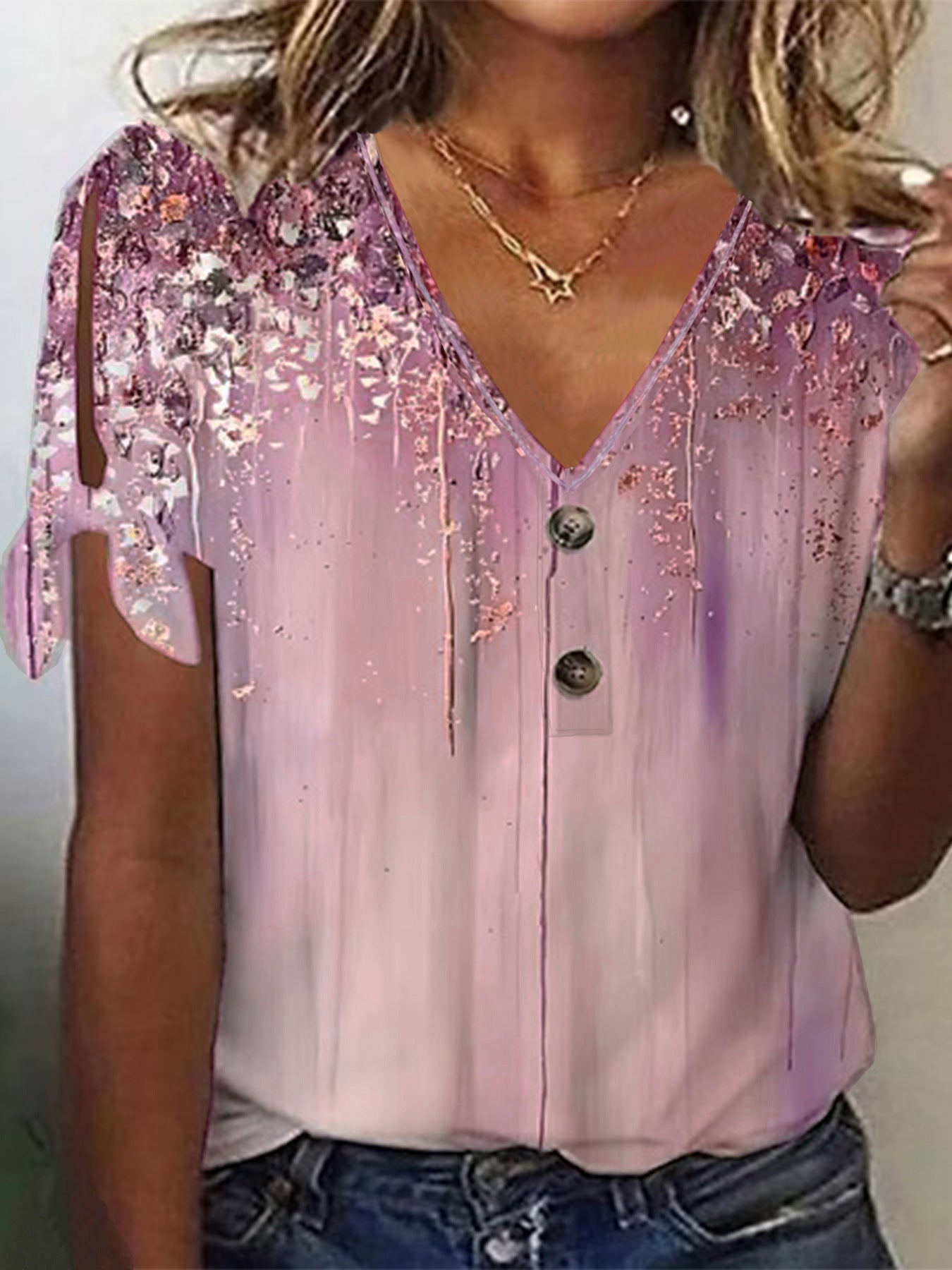 Women's V-neck blouse with decorative buttons and casual sleeves