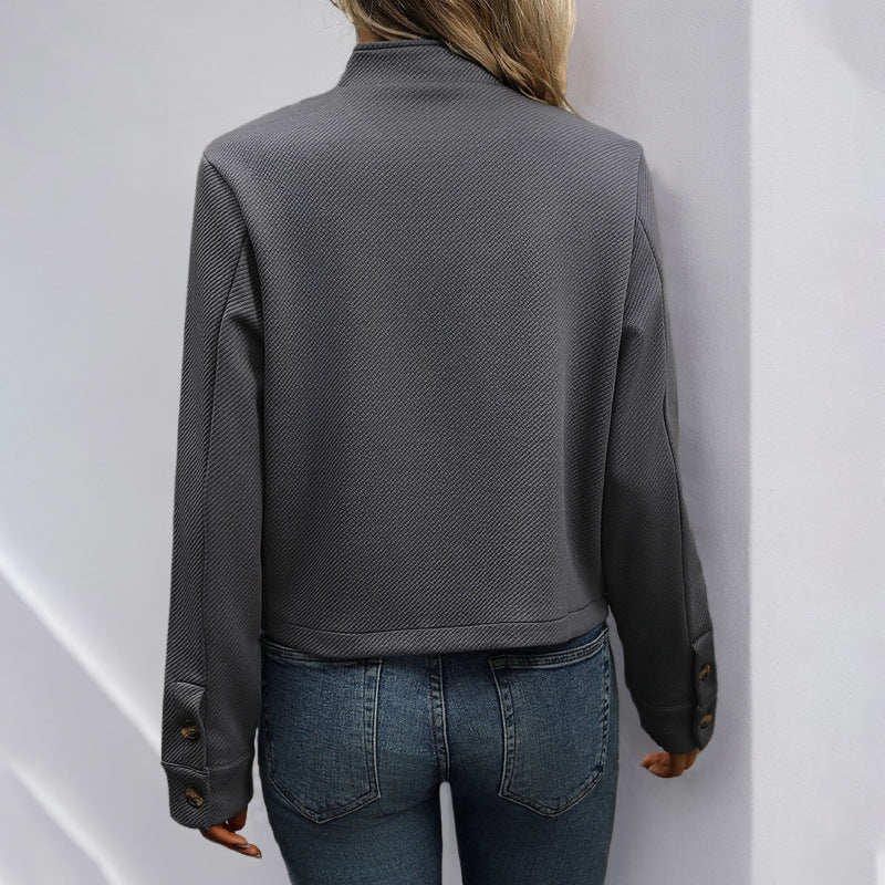 Women’s casual short jacket with button detail and textured fabric
