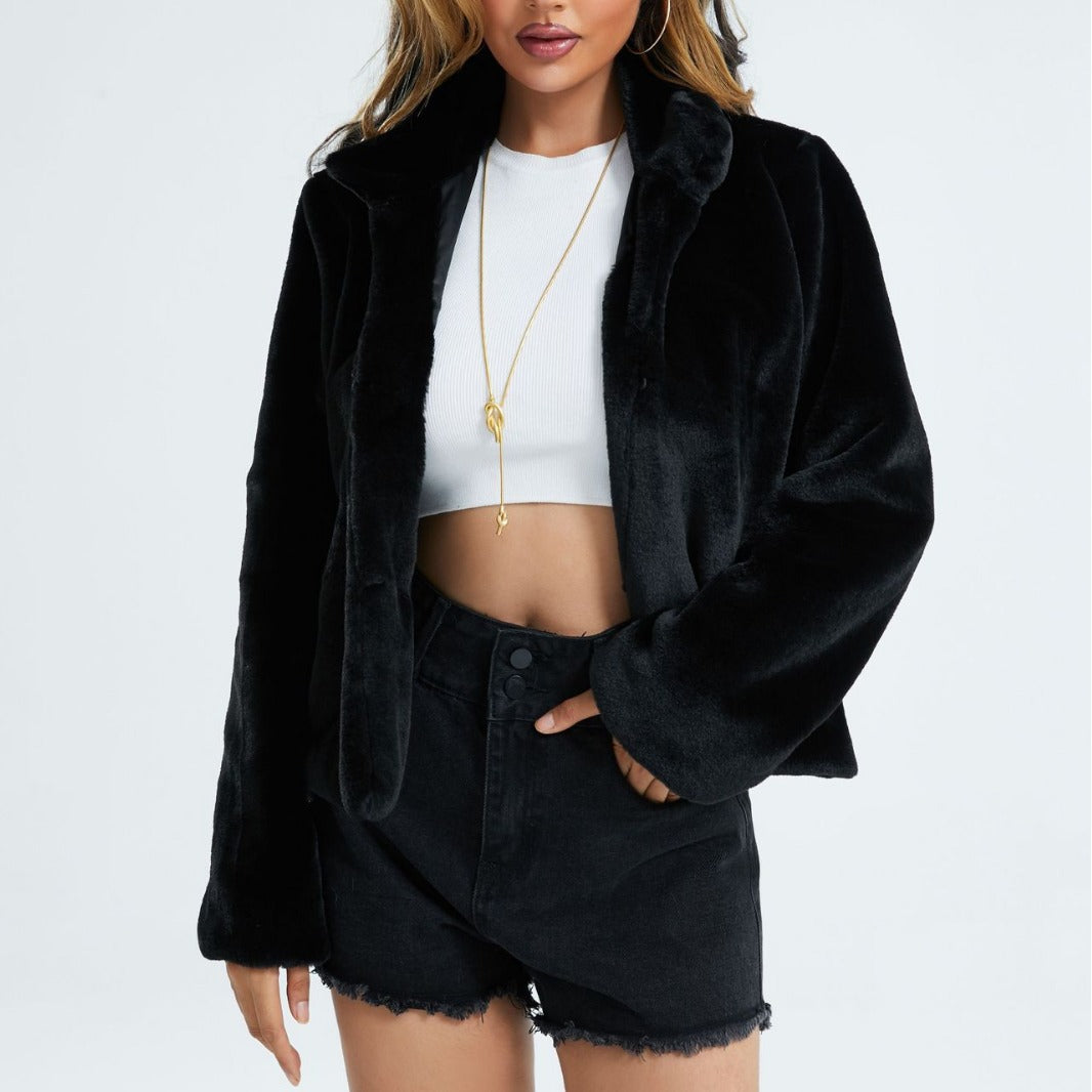 Ladies stylish short jacket made of the softest faux fur with wide lapels