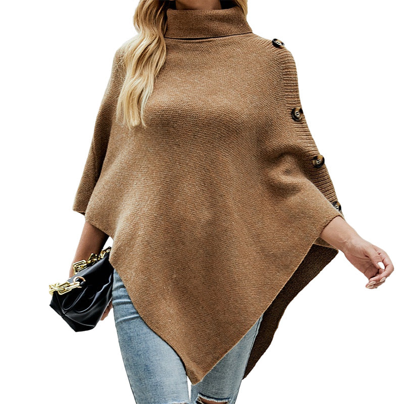 Women's oversized poncho with high collar and decorative button details