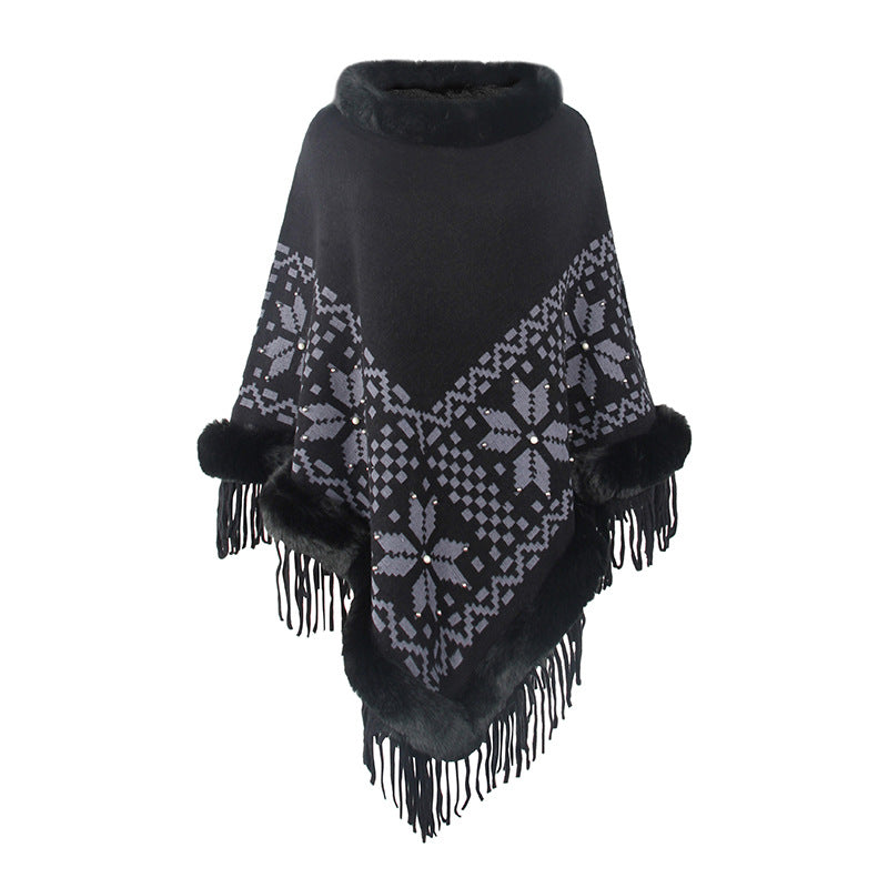 Ladies elegant poncho with decorative fringe design and faux fur trim