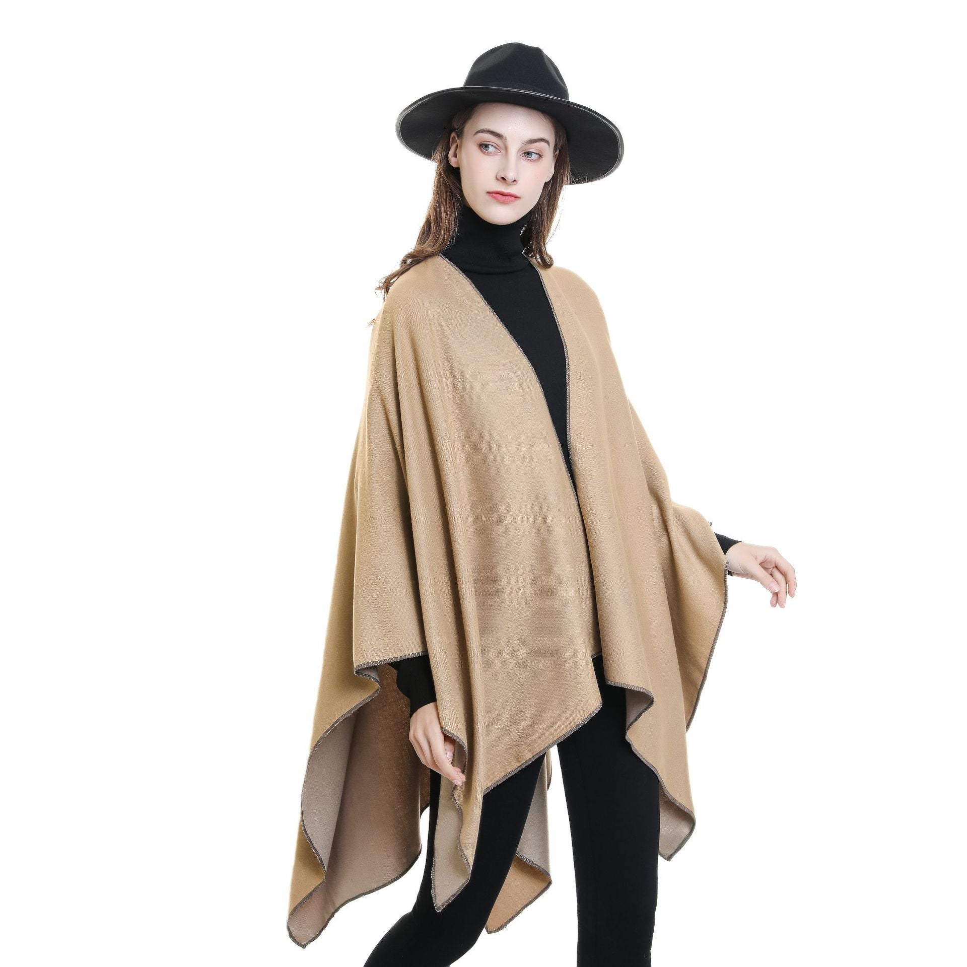 Women’s cozy poncho made of soft wool blend with elegant cut