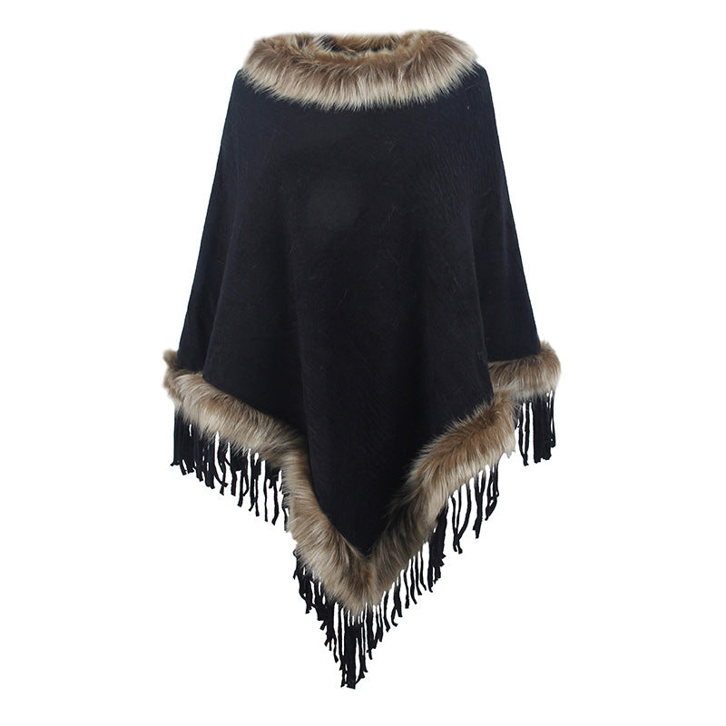 Women's elegant poncho with luxurious faux fur collar and decadent fringes