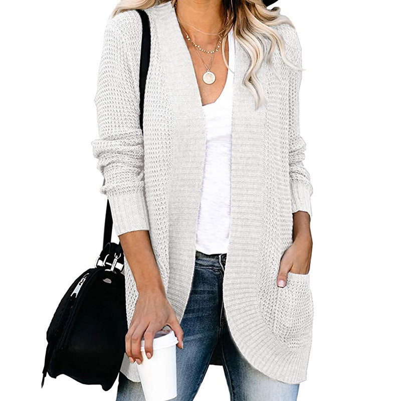 Women’s cardigan with open cut and side pockets