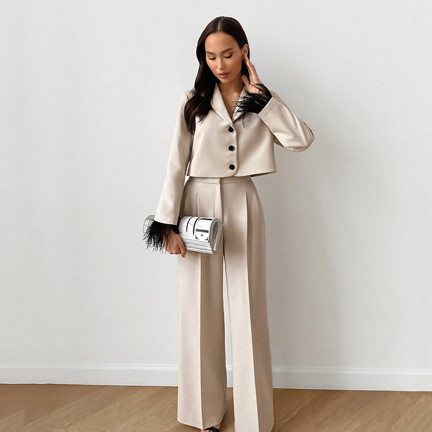 Ladies chic suit set with elegant feathers at the sleeves and high waistband
