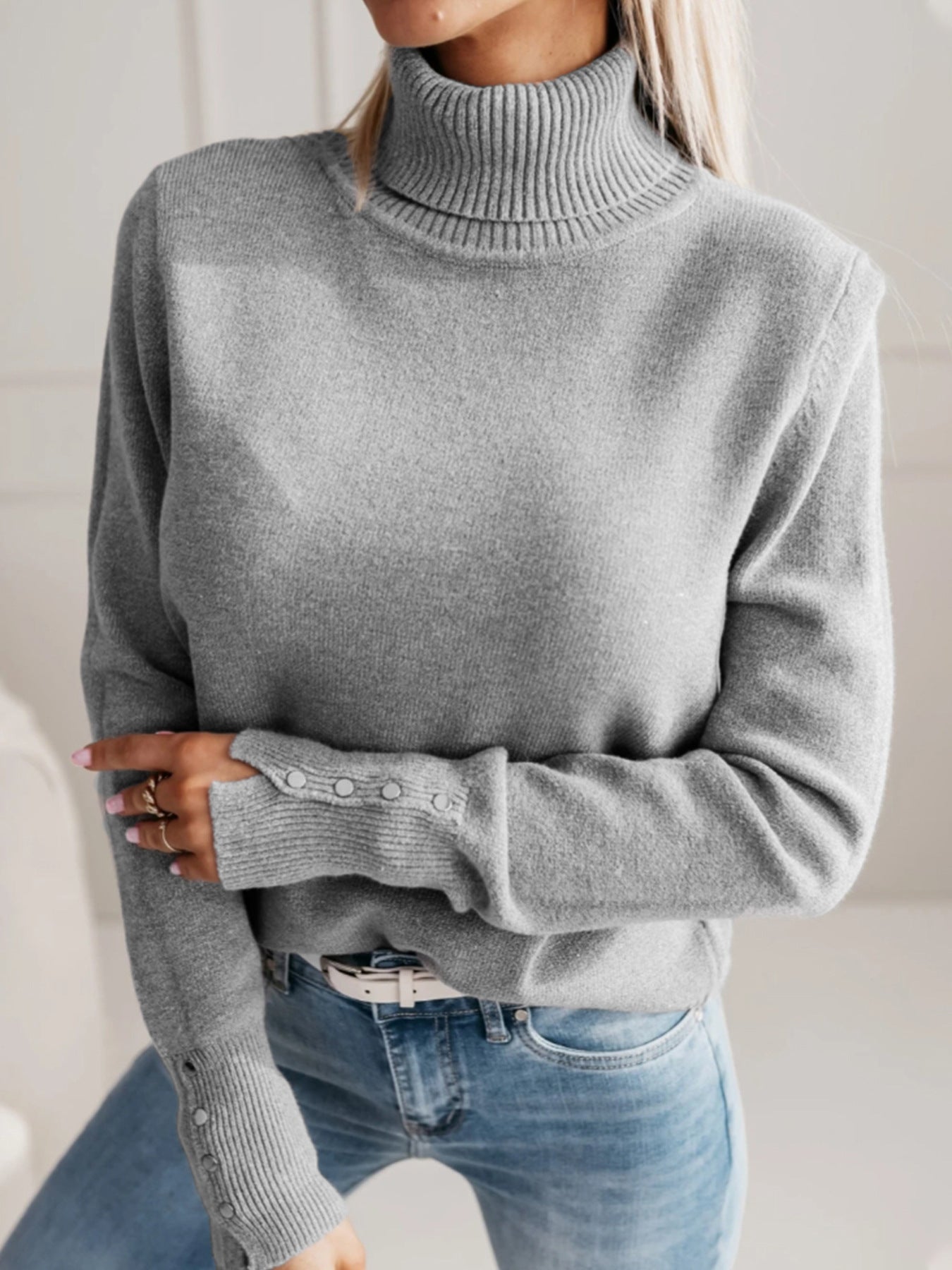Women's elegant turtleneck pullover with button details
