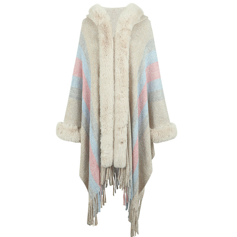 Ladies fashionable poncho with luxurious faux fur collar and fringes