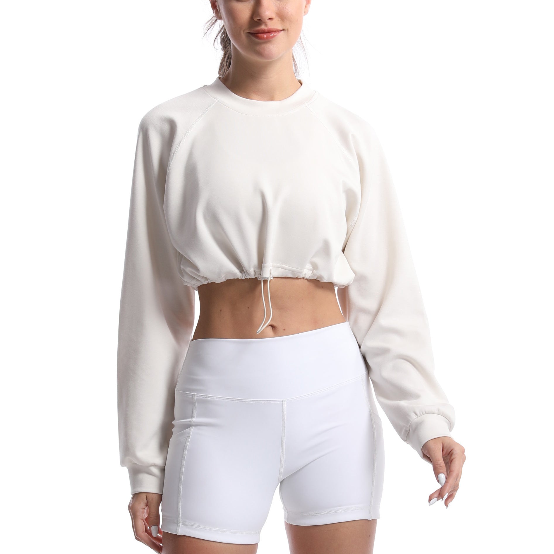Women's sporty crop pullover with adjustable hem and long sleeves