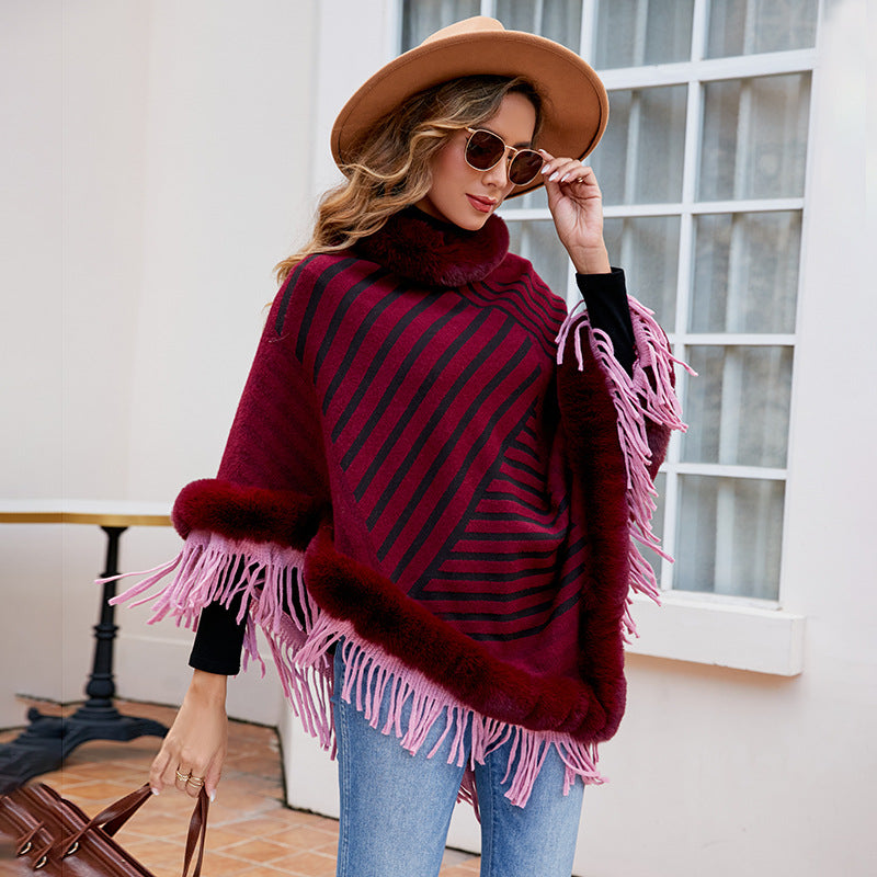 Ladies fashionable poncho with elegant fringe decoration