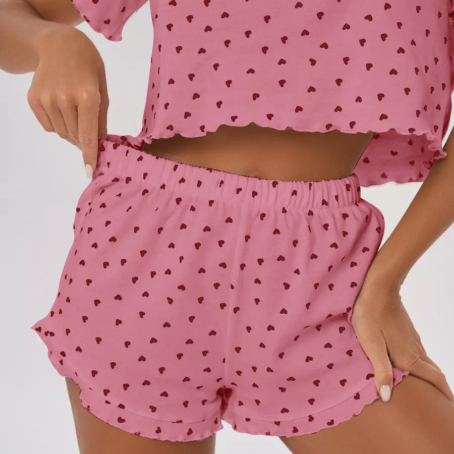 Women's pajama set with playful heart motif and elastic waistband