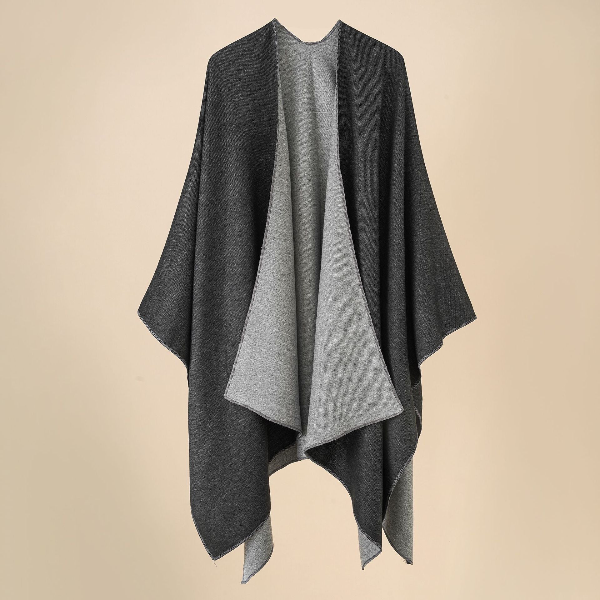 Women’s cozy poncho made of soft wool blend with elegant cut