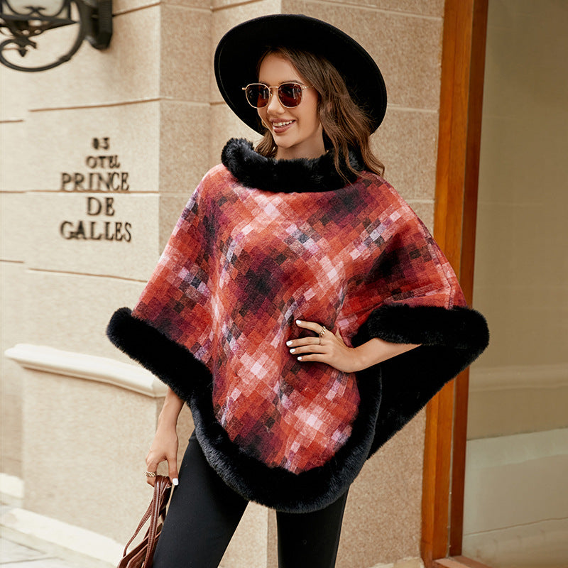 Ladies fashionable poncho with luxurious faux fur collar