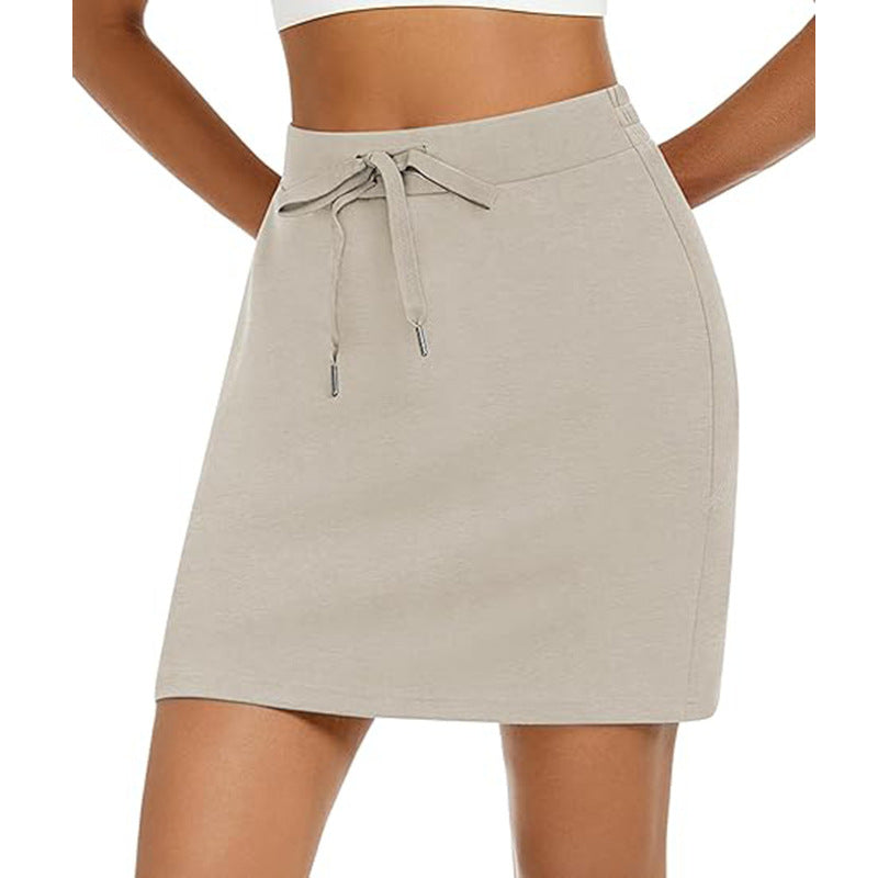 Women's sporty mini skirt with adjustable drawstring and side pockets