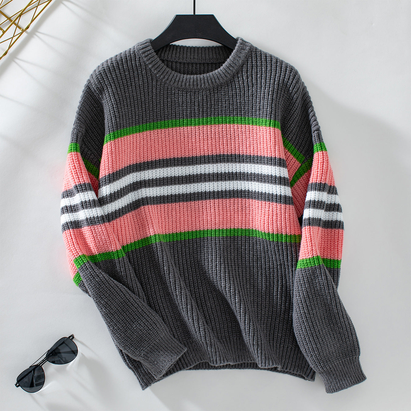 Ladies loose knit pullover with colorful block stripes and round neckline
