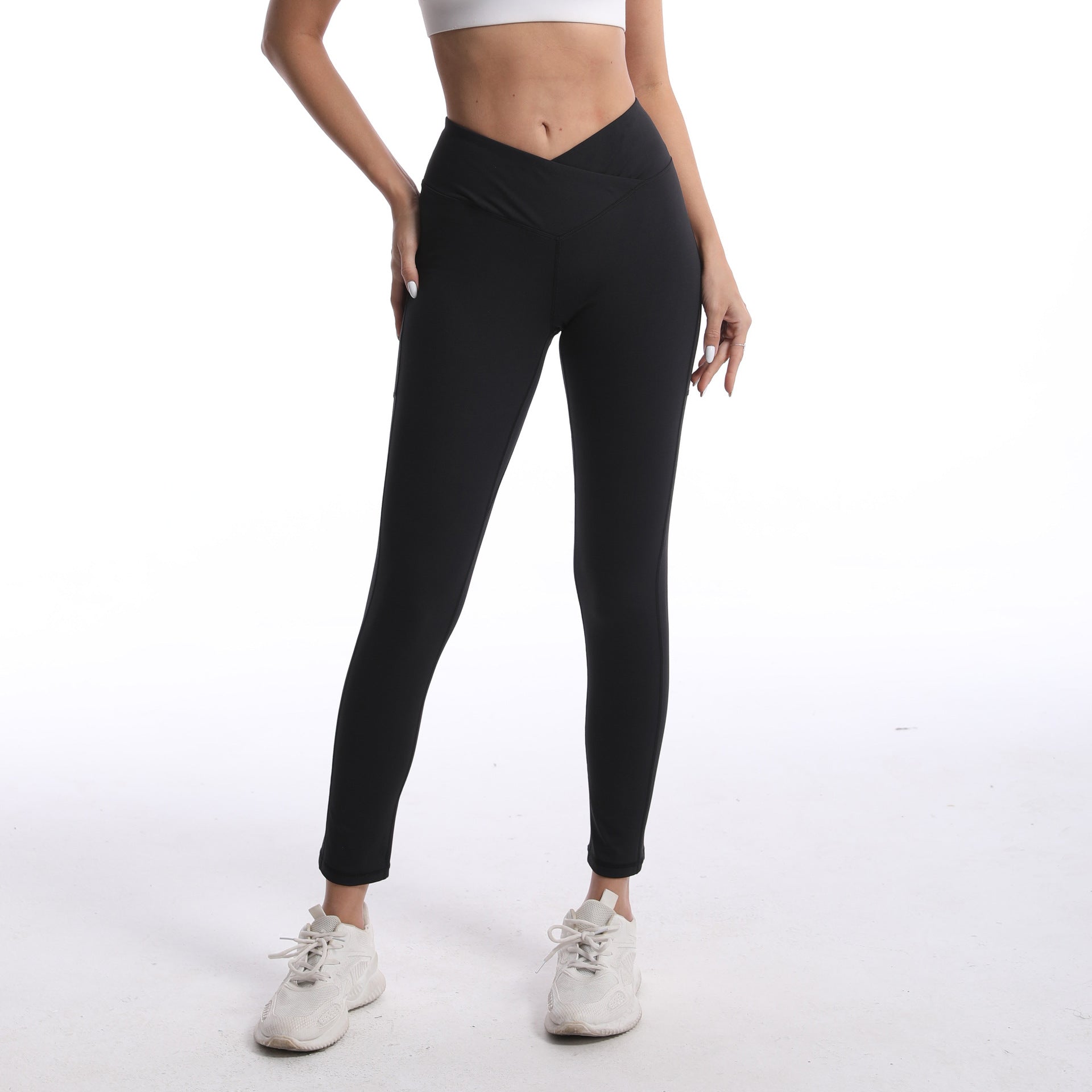 Women's figure-hugging sports leggings with high waistband and cross design