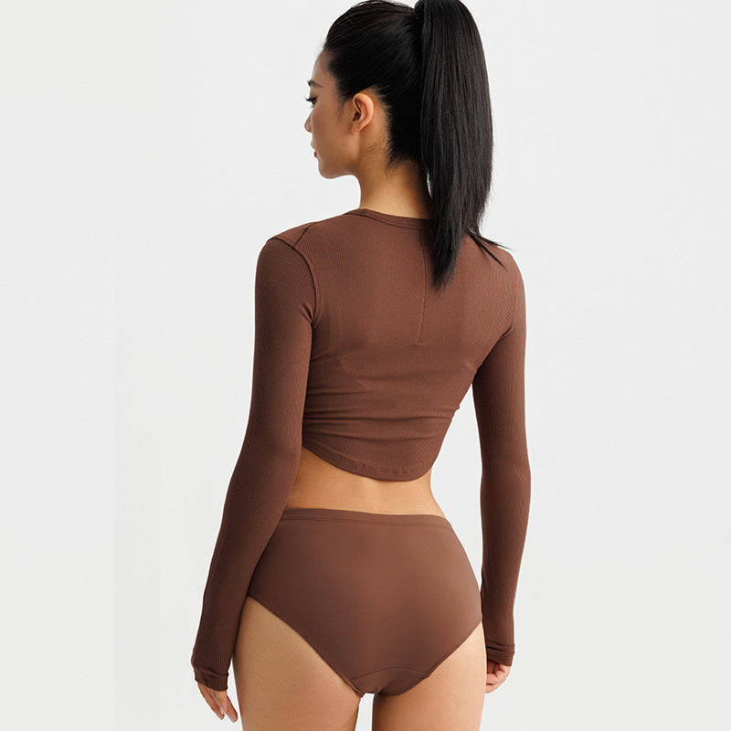 Women's stylish long sleeve crop top made of elastic ribbed material with round neckline