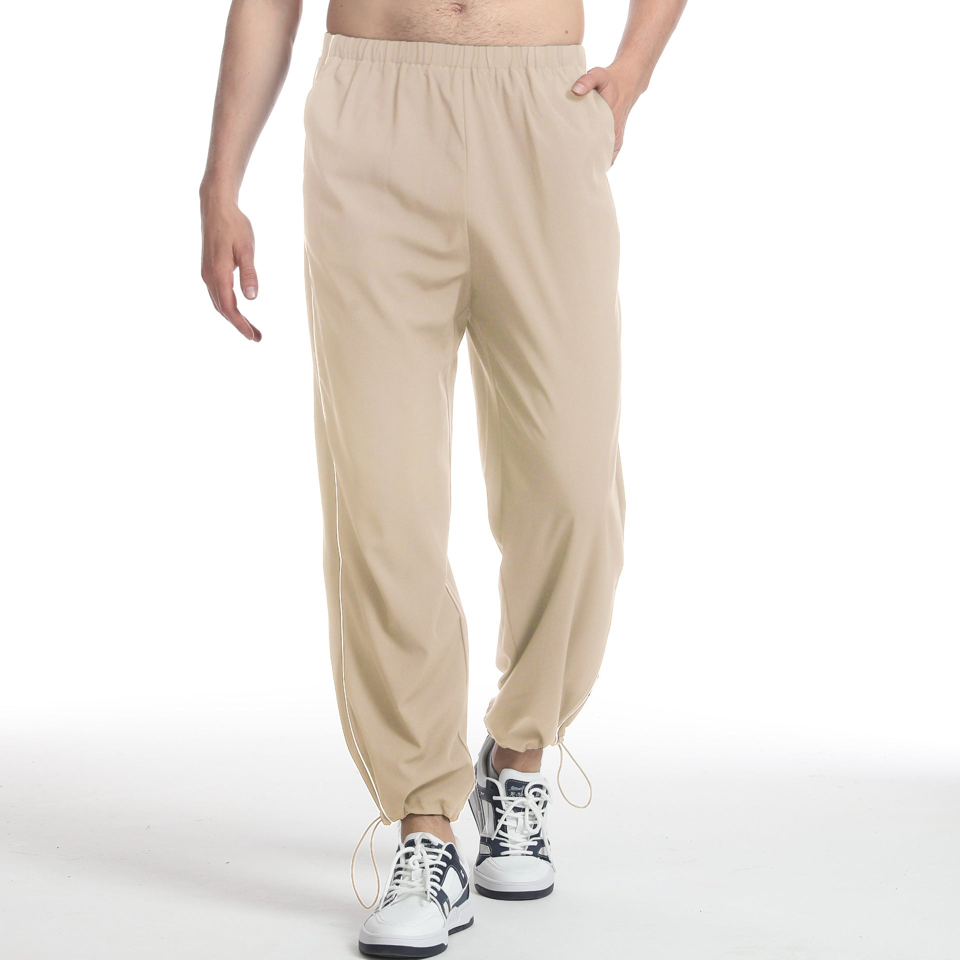 Men's sporty jogging pants with elastic waistband and side zippers