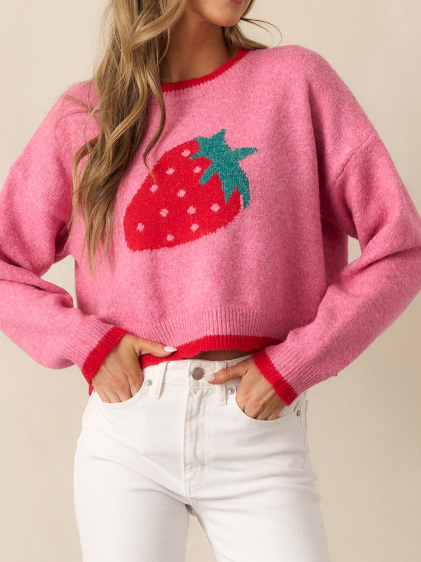 Women’s trendy pullover with strawberry motif and contrast cuffs