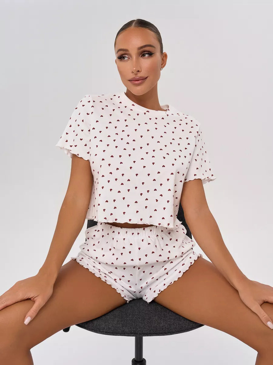 Women's pajama set with cheerful heart design and playful hem