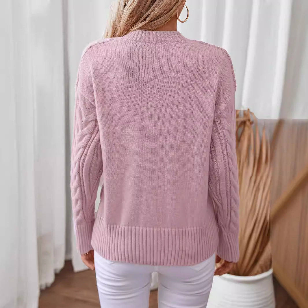 Women's fashionable knitted pullover with deep V-neck and cable pattern