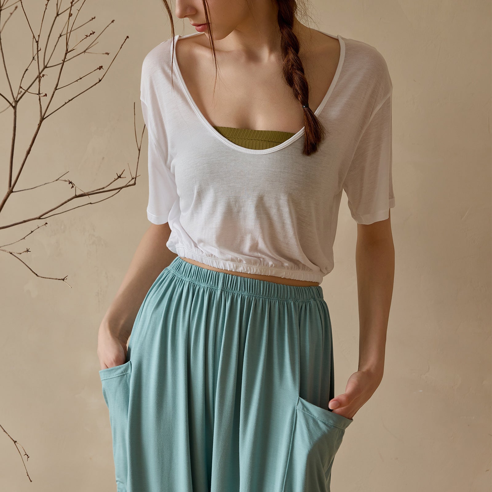 Women's casual short sleeve top with elastic waistband and loose fit