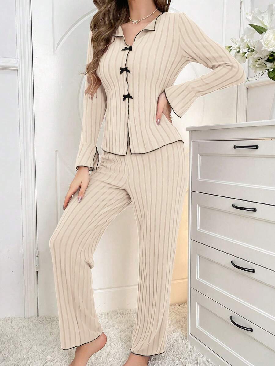 Women's pajama set with fine stripe texture and elegant details
