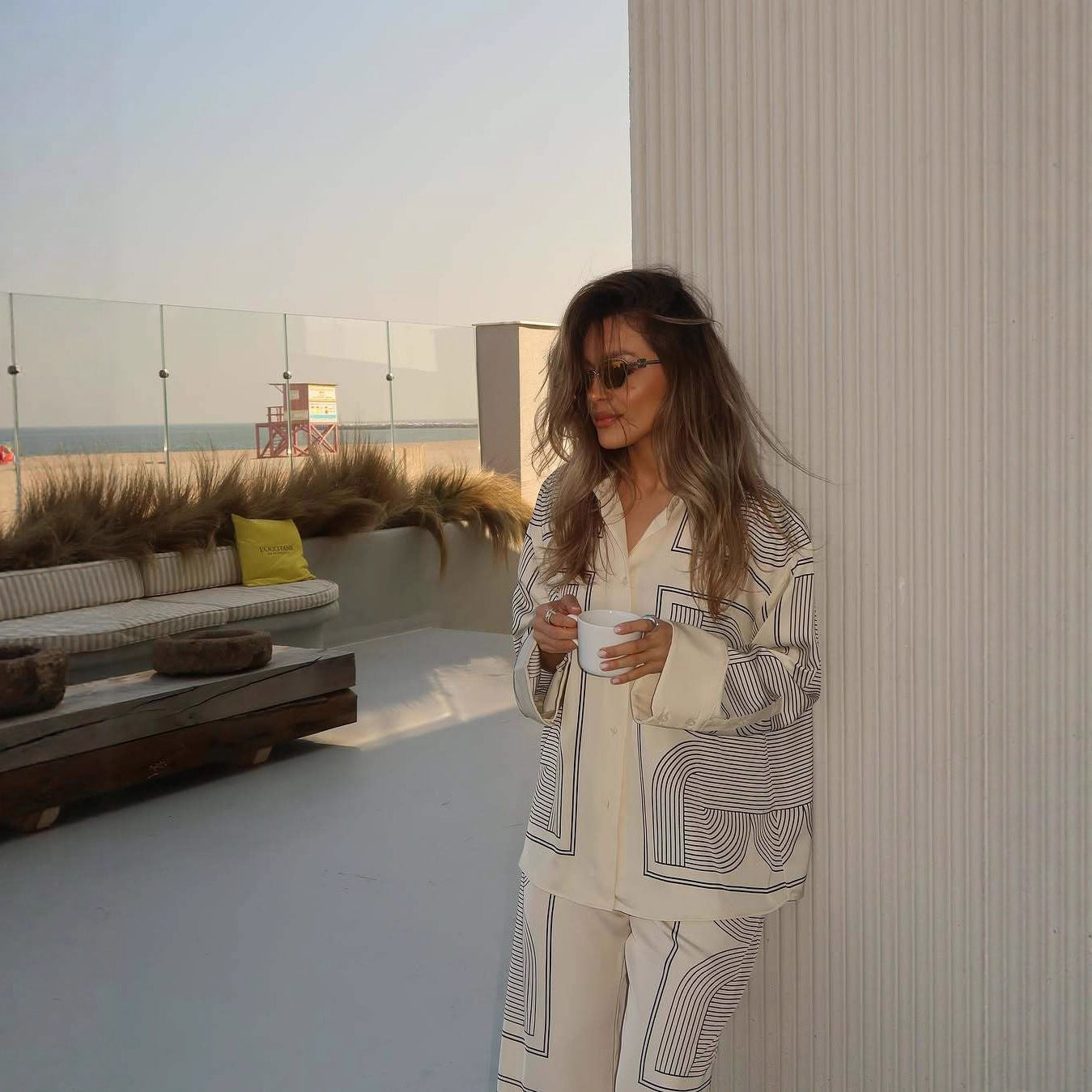 Women’s set of casual shirt and wide pants in geometric design