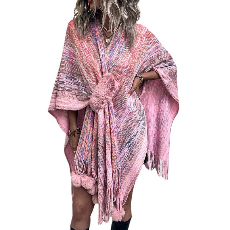 Ladies fashionable poncho with luxurious faux fur trim and creative fringes