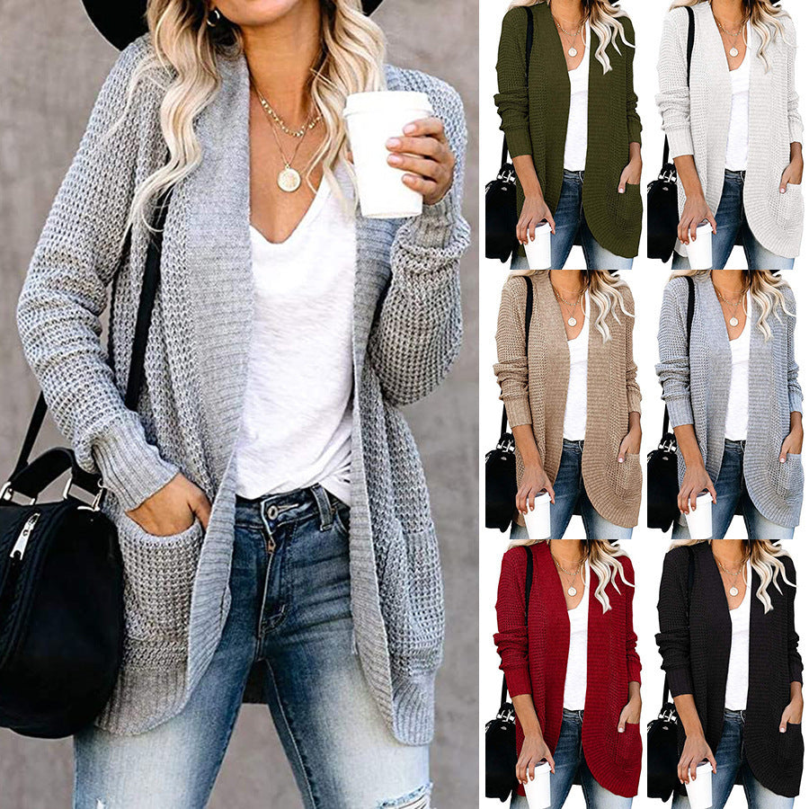 Women’s cardigan with open cut and side pockets