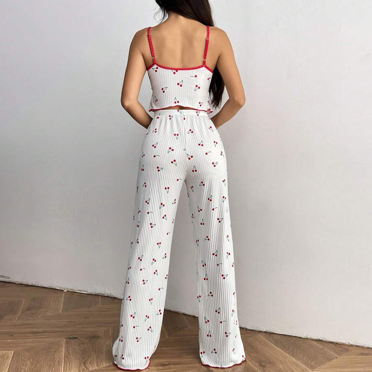 Ladies pajama set with fruity strawberry pattern and ruffle details