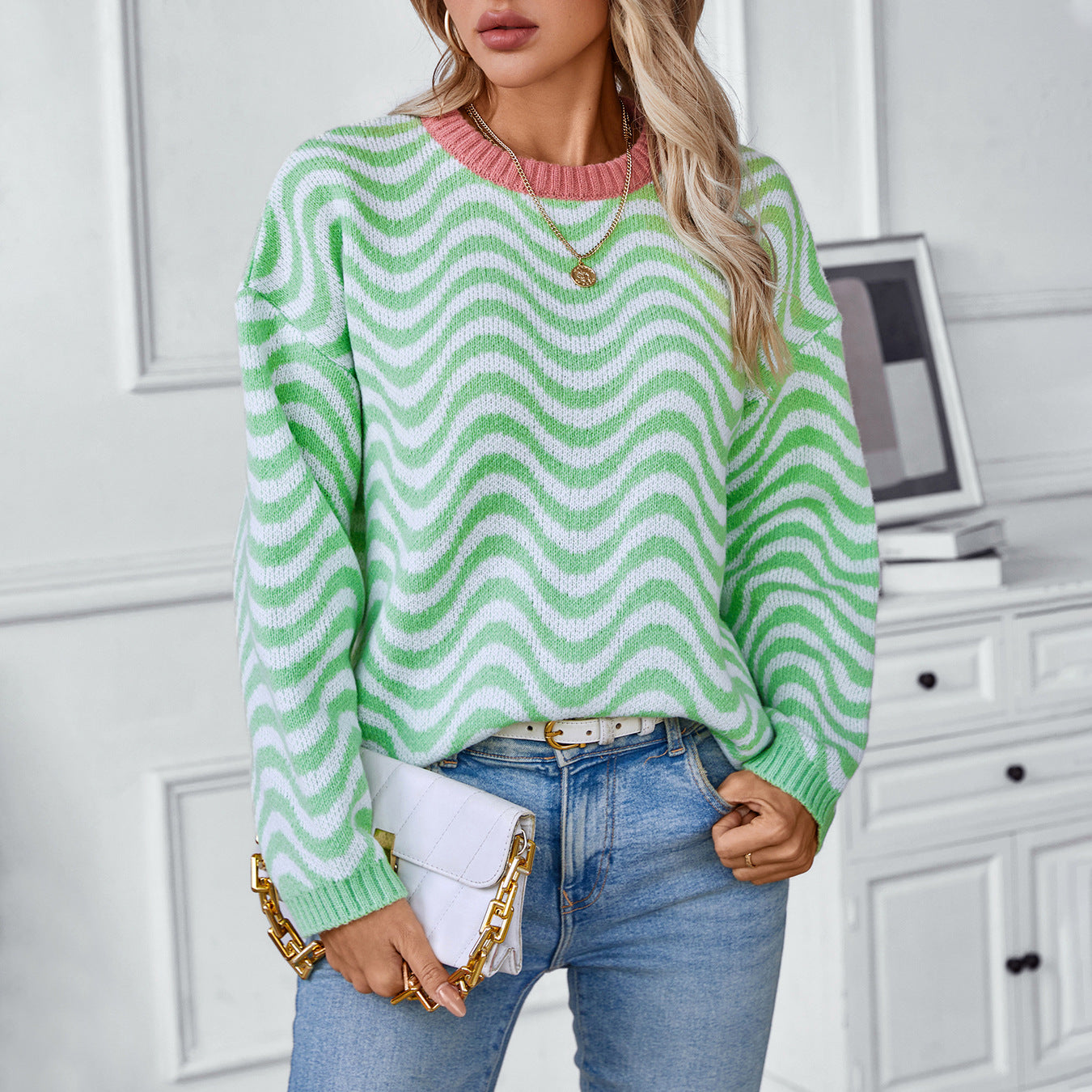 Women's cozy pullover with modern wave patterns and minimalist fit