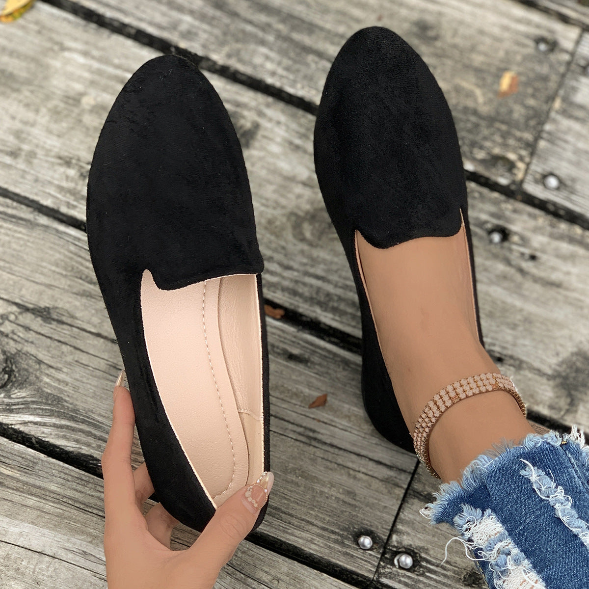 Ladies comfortable slippers in elegant design with soft surface texture