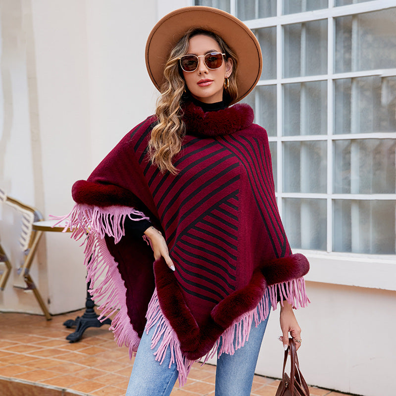 Ladies fashionable poncho with elegant fringe decoration