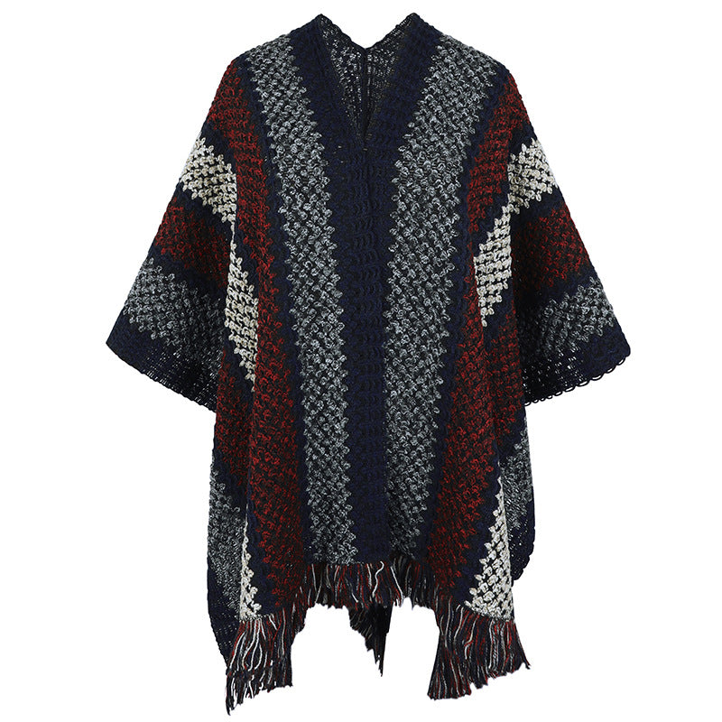 Women's knit poncho with V-neck and fringes