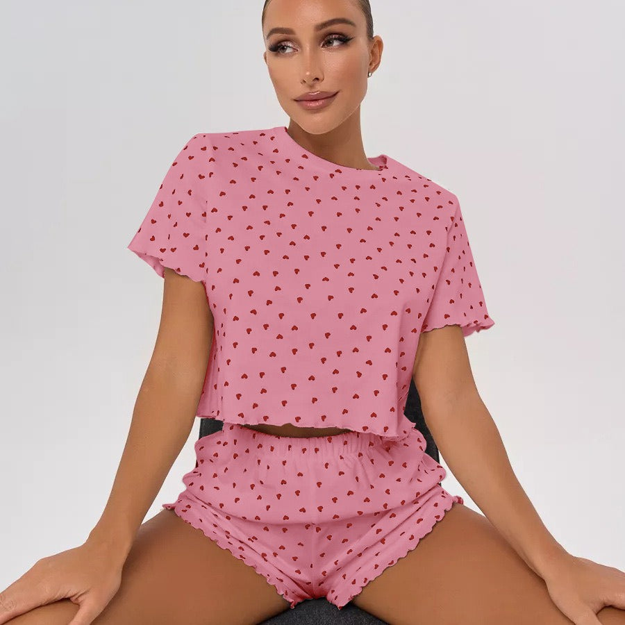 Women's pajama set with playful heart motif and elastic waistband