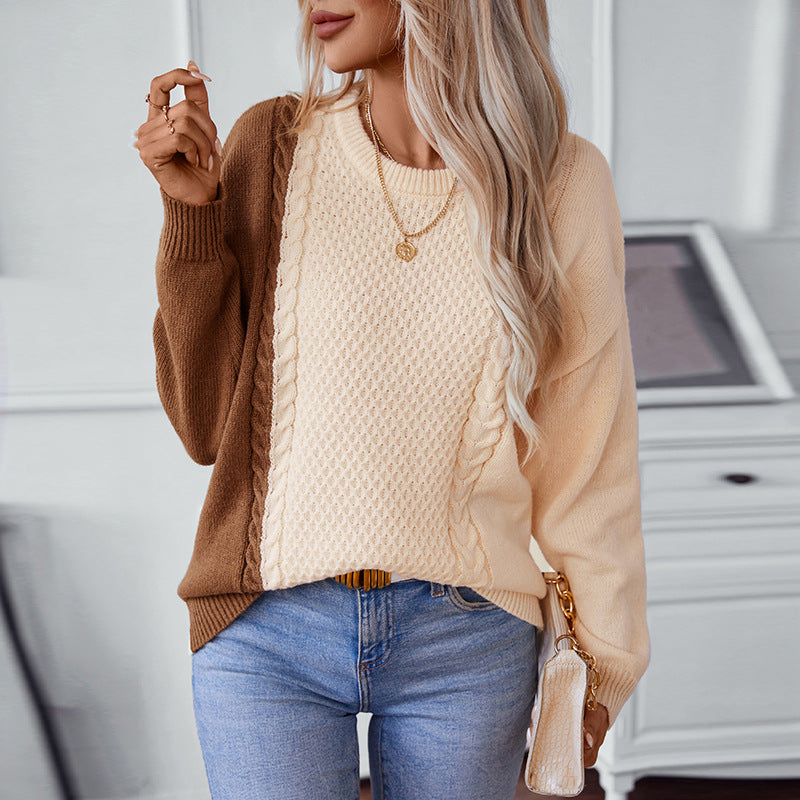 Ladies fashionable pullover with textured cable pattern and innovative color block design