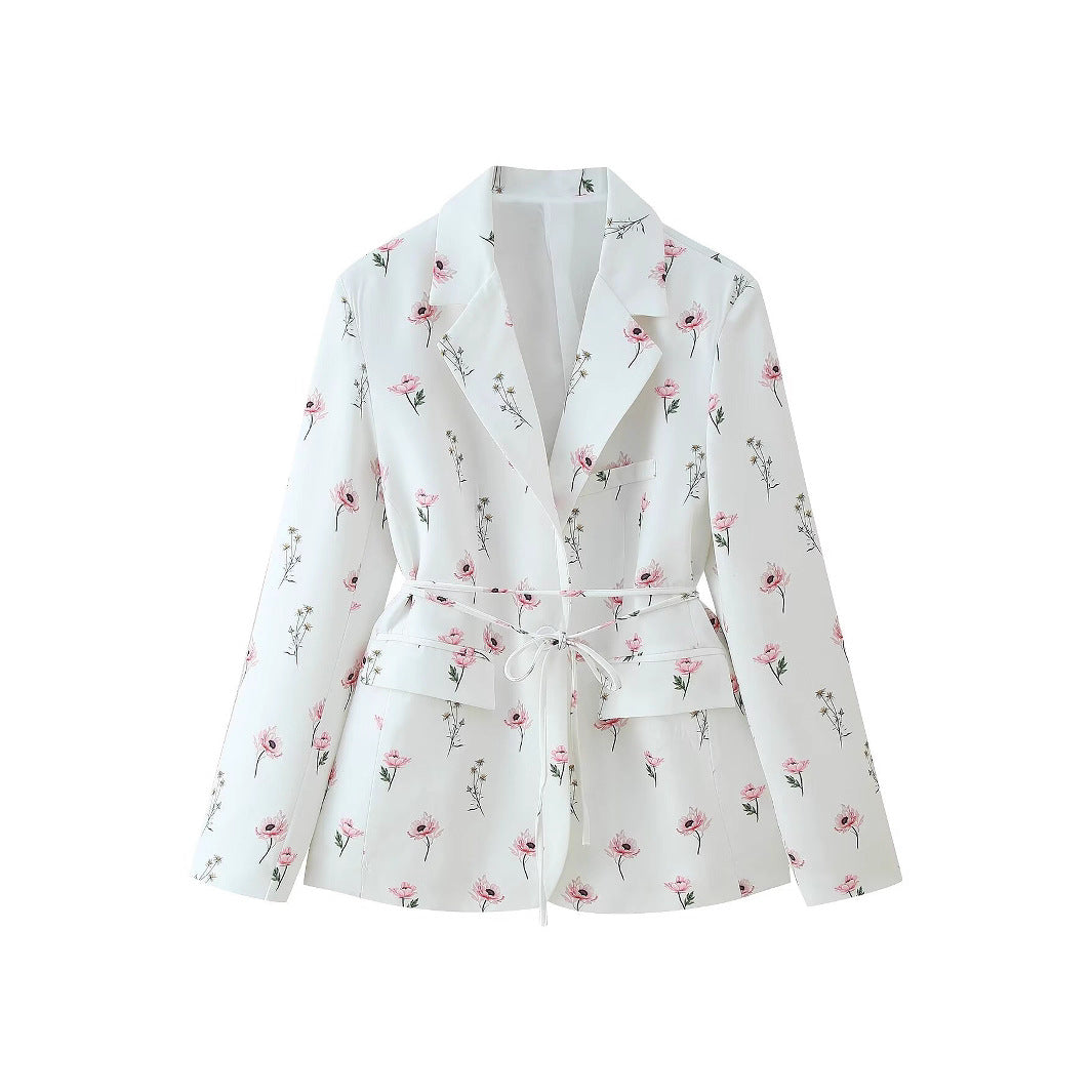 Ladies stylish blazer jacket with floral design and fitted belt