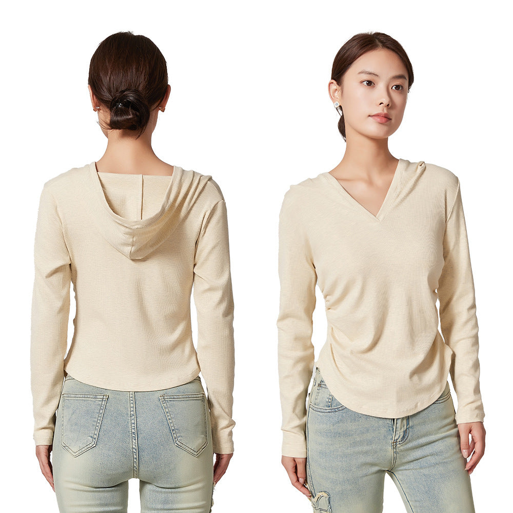 Ladies sporty top with hood and fitted cut