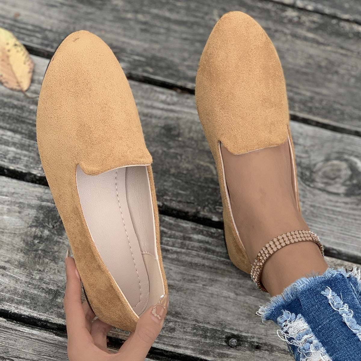 Ladies comfortable slippers in elegant design with soft surface texture