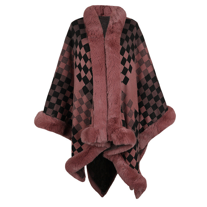 Ladies elegant knitted poncho with luxurious faux fur trim and geometric pattern