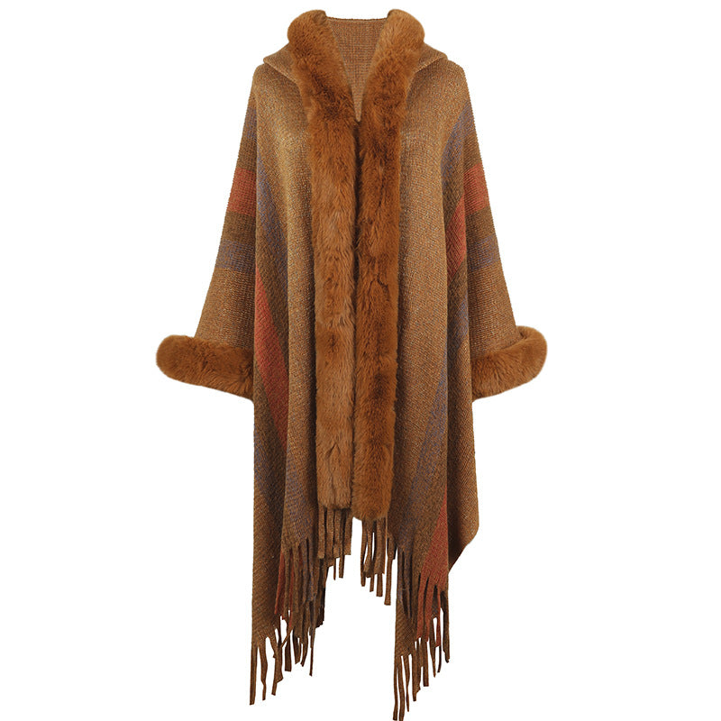 Ladies fashionable poncho with luxurious faux fur collar and fringes