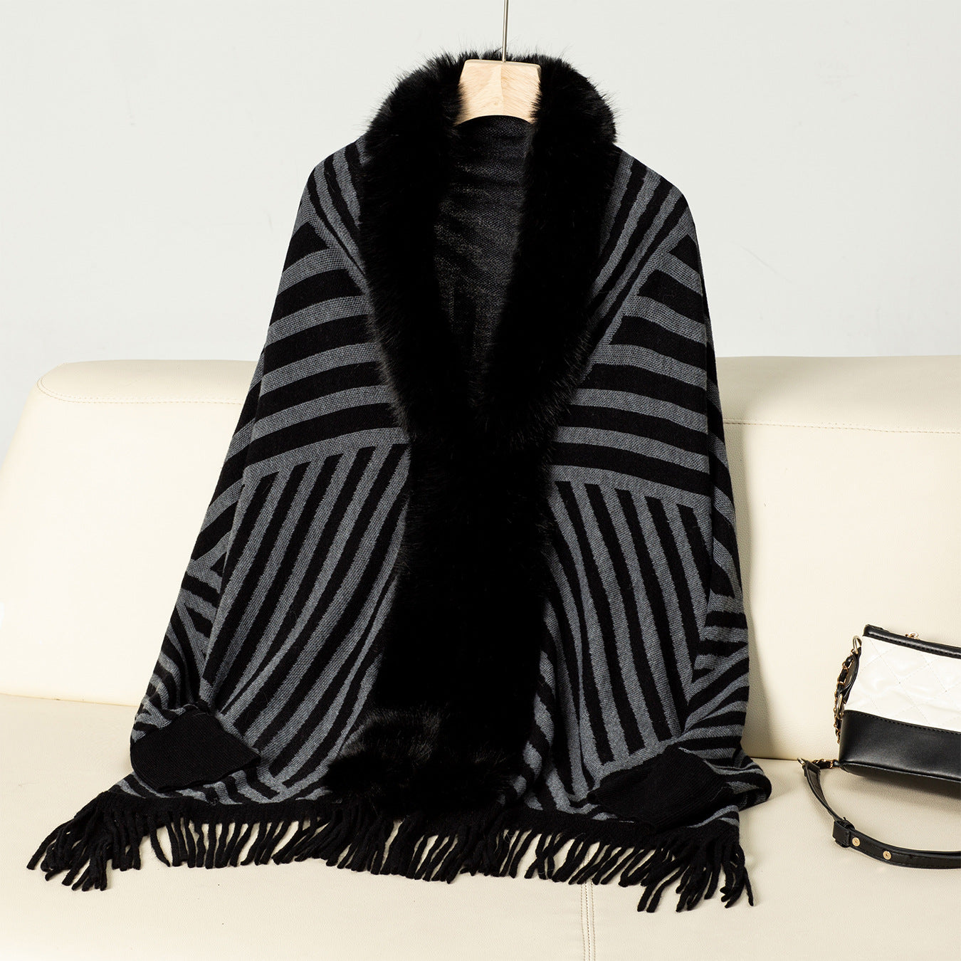 Women's Knit Poncho with Elegant Faux Fur Collar and Fringed Design