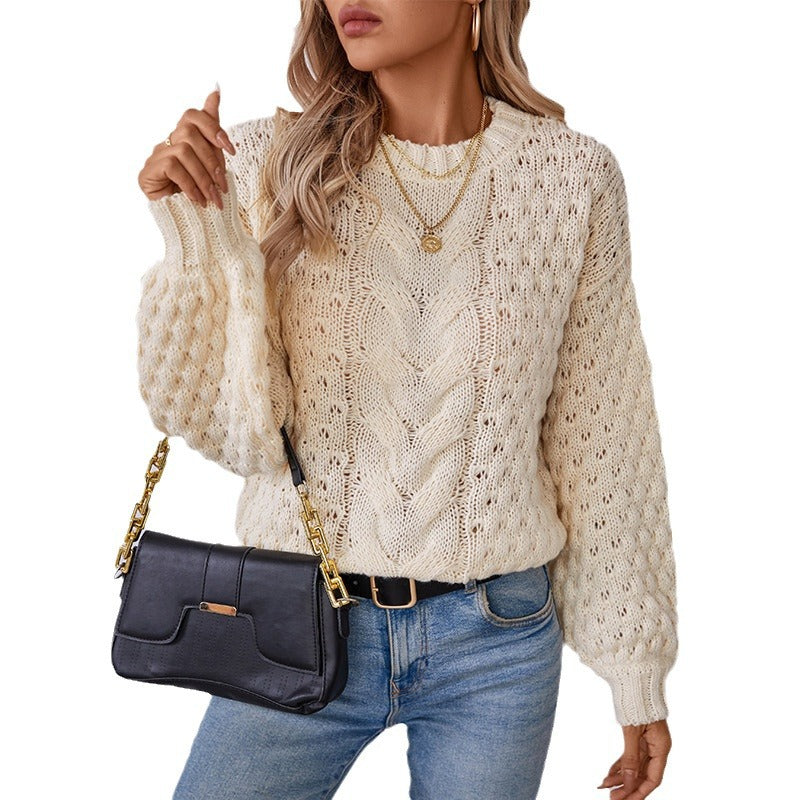 Women's cozy knit pullover with textured cable pattern and casual fit