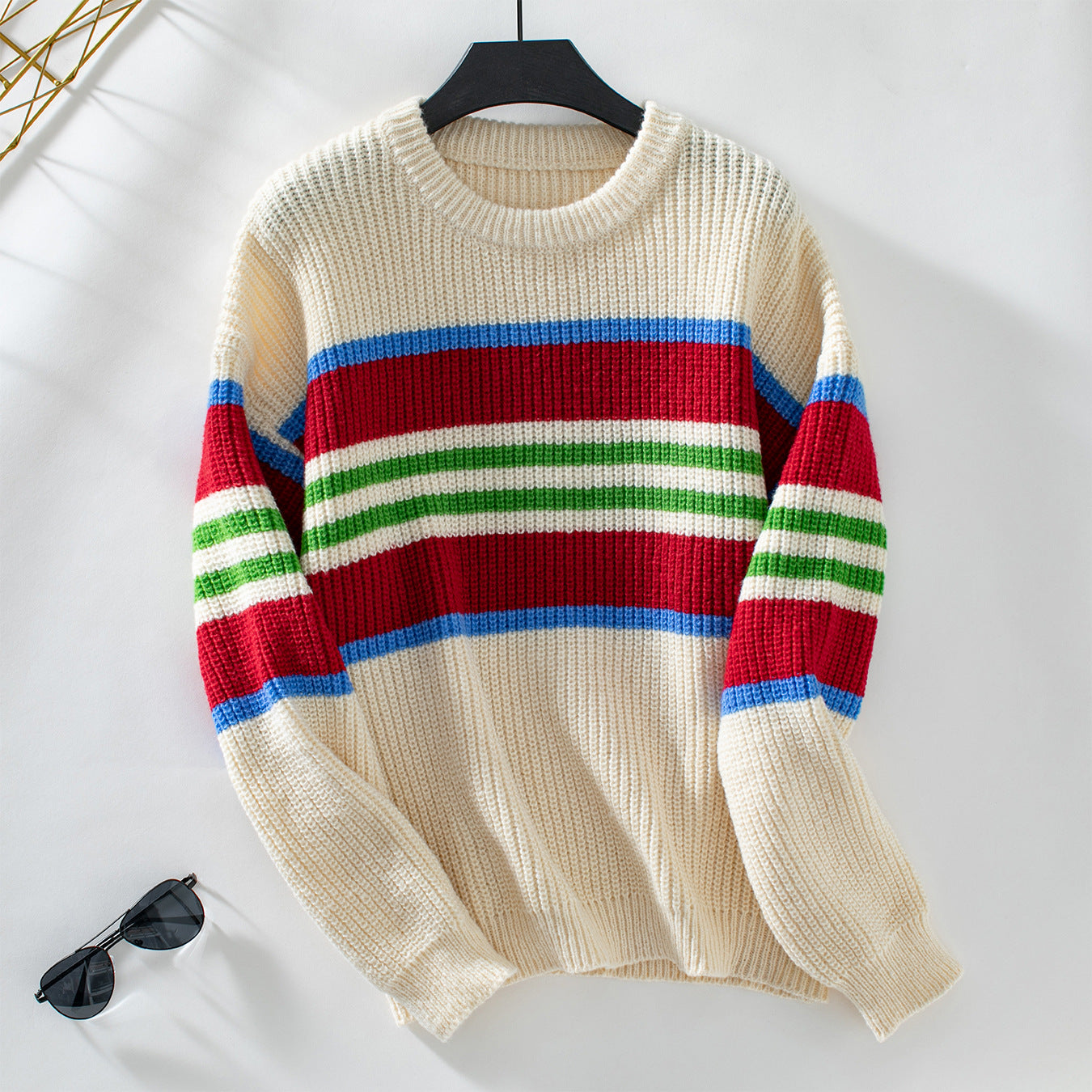 Ladies loose knit pullover with colorful block stripes and round neckline